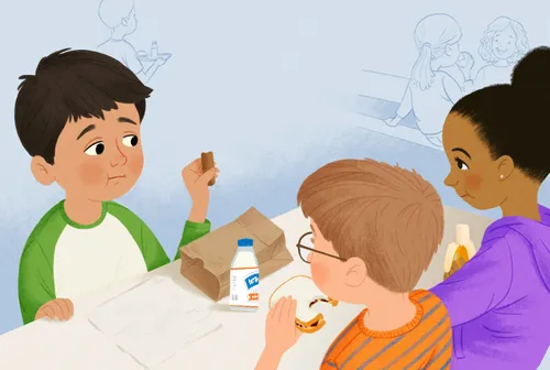 Boy sitting at lunch table