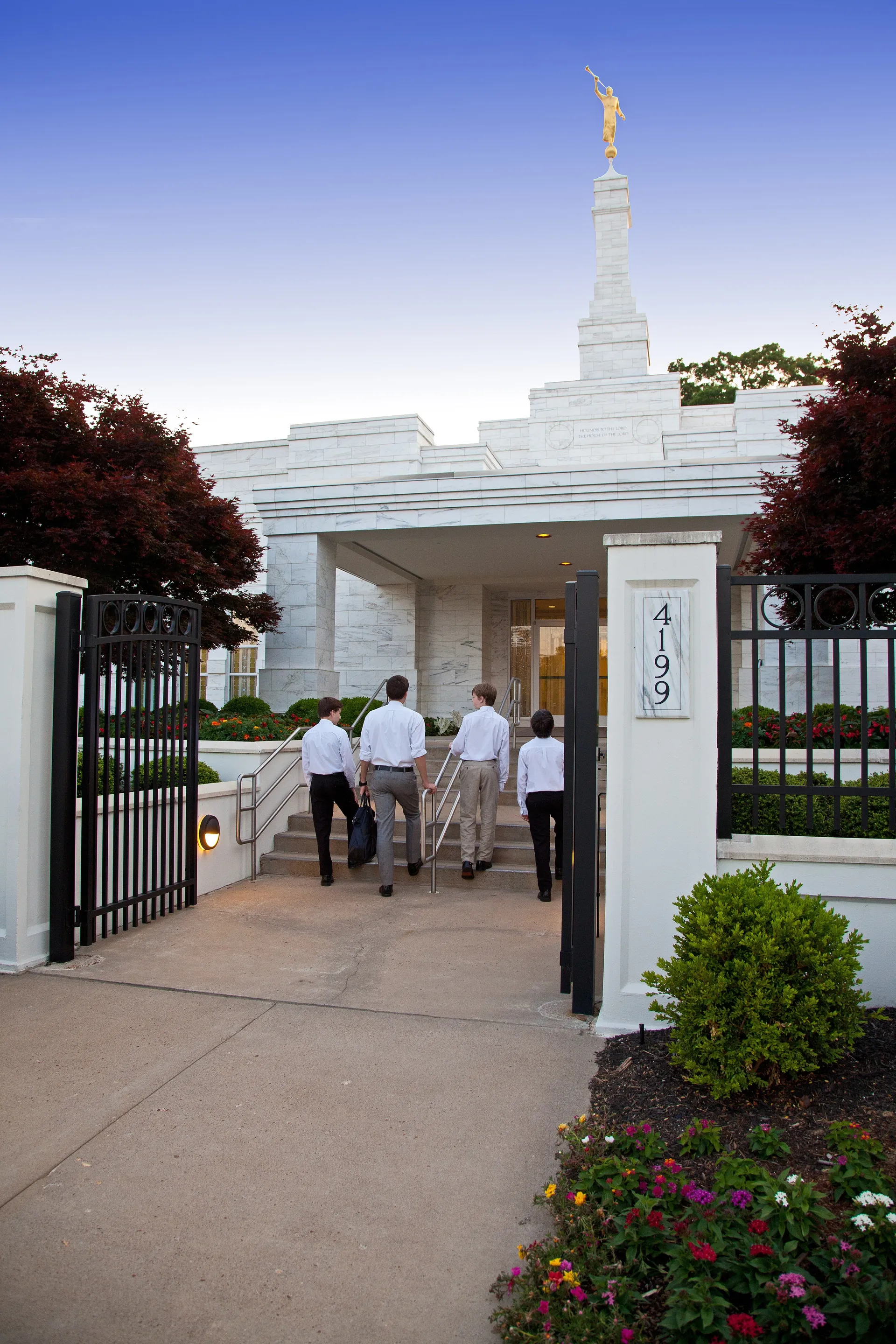 Young men walking up the stairs at the Memphis Tennessee Temple.