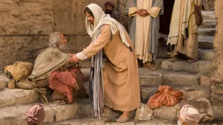 Jesus healing a lame man.  Outtakes include some of the other cast members, Jesus and disciples, and Jesus helping the lame man up by the hand.