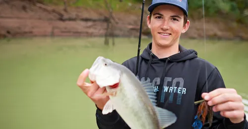 young man fishing