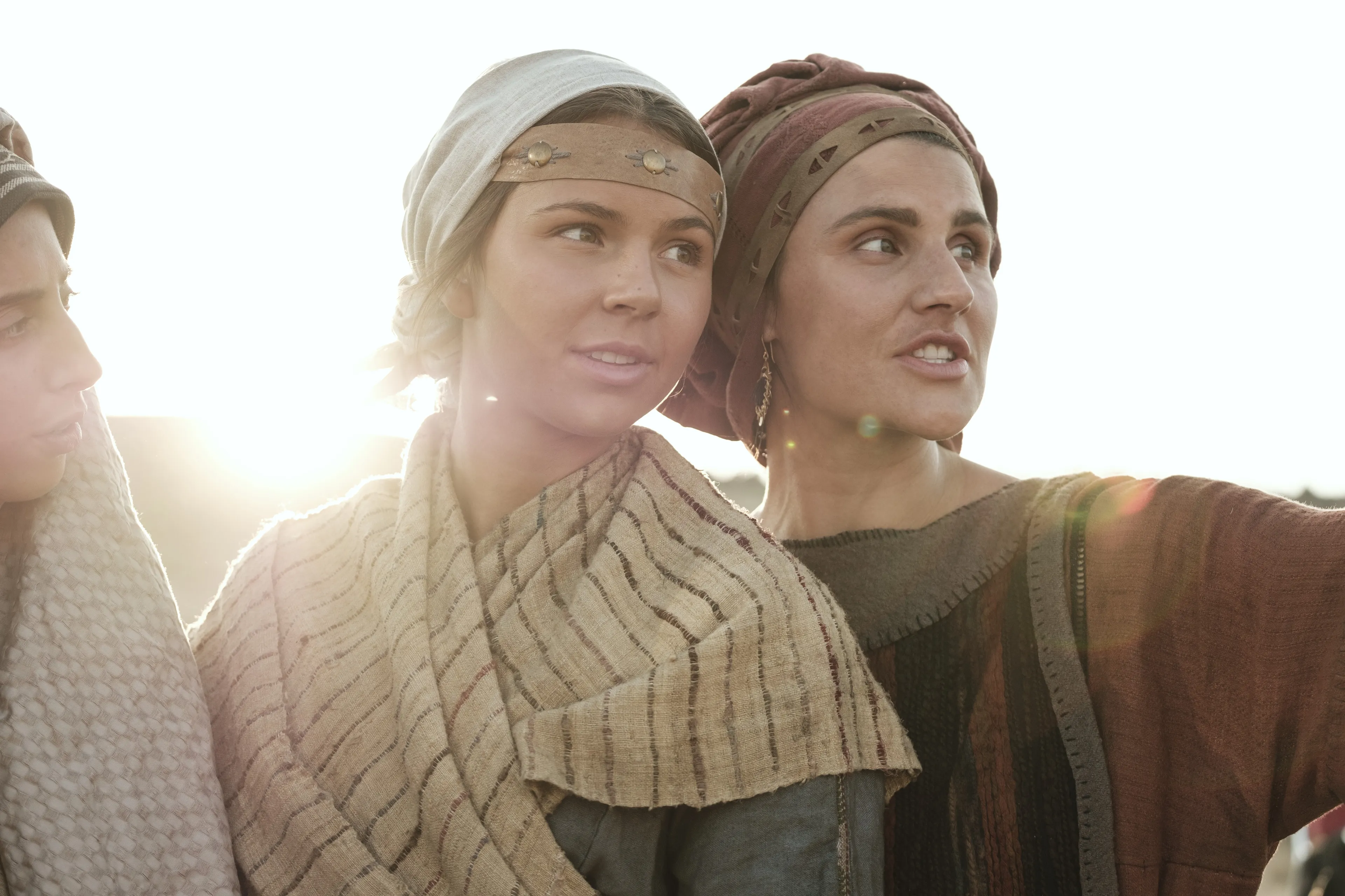 Ishmael's daughters look into the distance in the wilderness.