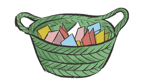 basket full of folded paper