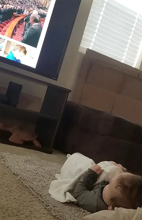 Sammy Ho Ching watching conference