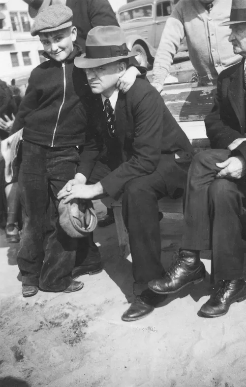 young Tom Monson and father