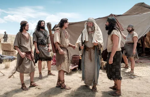 Nephi and his brothers showing his broken bow to Lehi