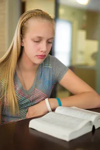 youth studying the Bible