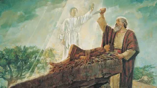 The Old Testament prophet standing beside an altar.  Abraham's son Isaac is strapped to the altar.  Abraham is holding a dagger in the air as he prepares to sacrifice Isaac. An angel is appearing before Abraham and commanding him to not sacrifice his son.