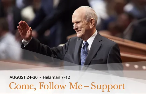 President Russell M. Nelson waving to audience at conference