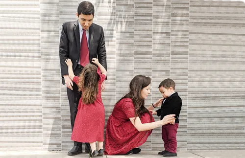 family getting ready for church