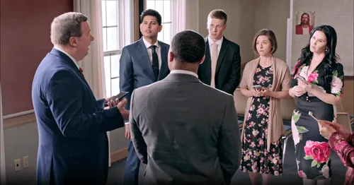adults gathered in classroom