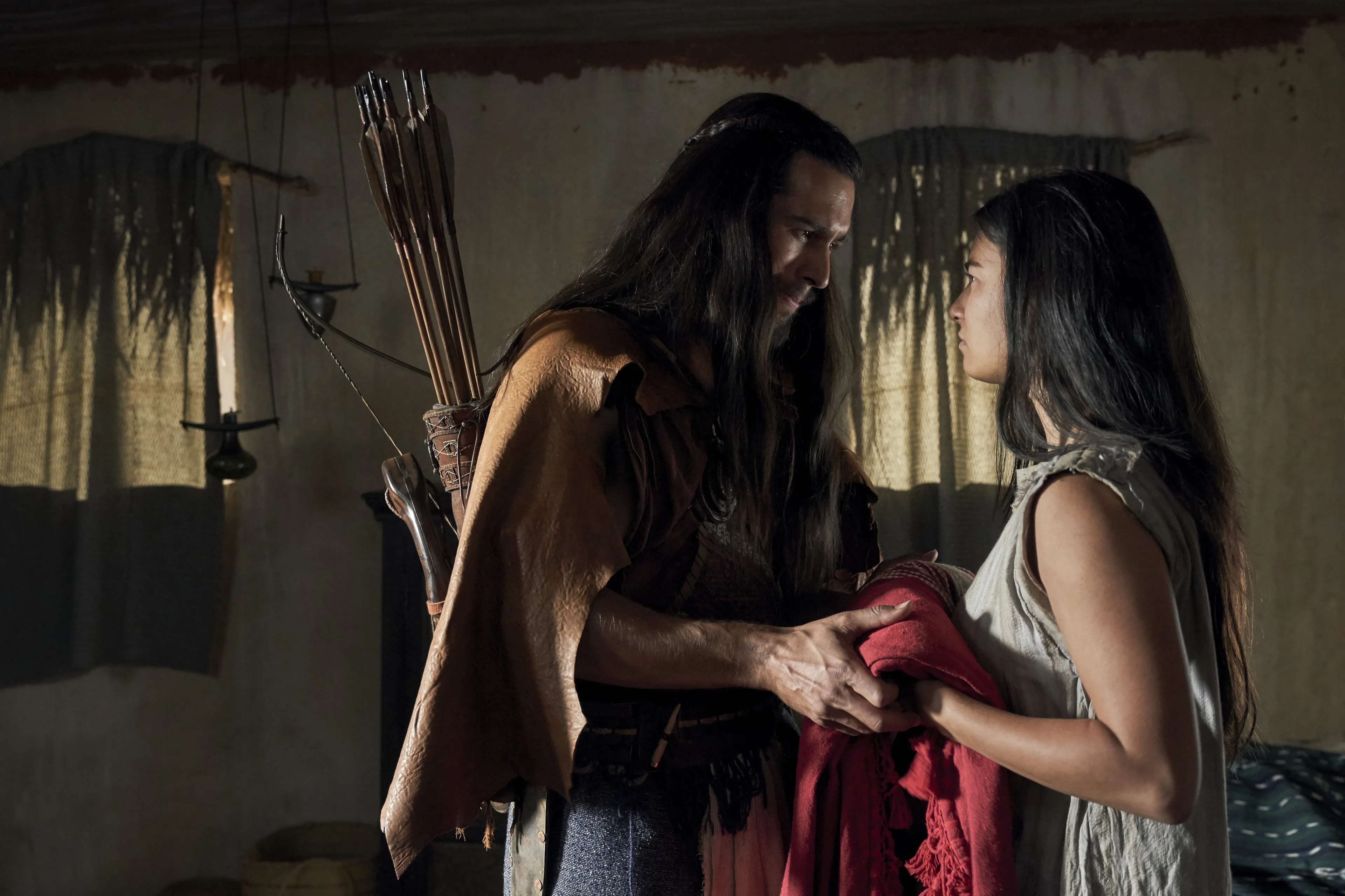 Enos says goodbye to his wife as he leaves to go hunting.