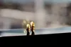 two gold rings on windowsill