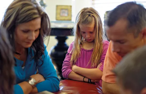 family praying
