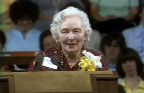 Sister Camilla Kimball speaking at the pulpit