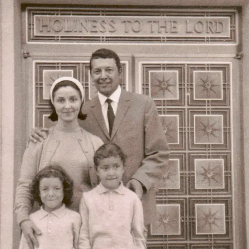 family in front of temple