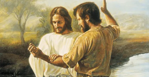 John the Bapist baptizing Jesus Christ in the River Jordan. A landscape of trees and mountains is in the background.