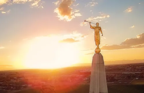 angel Moroni statue at sunset