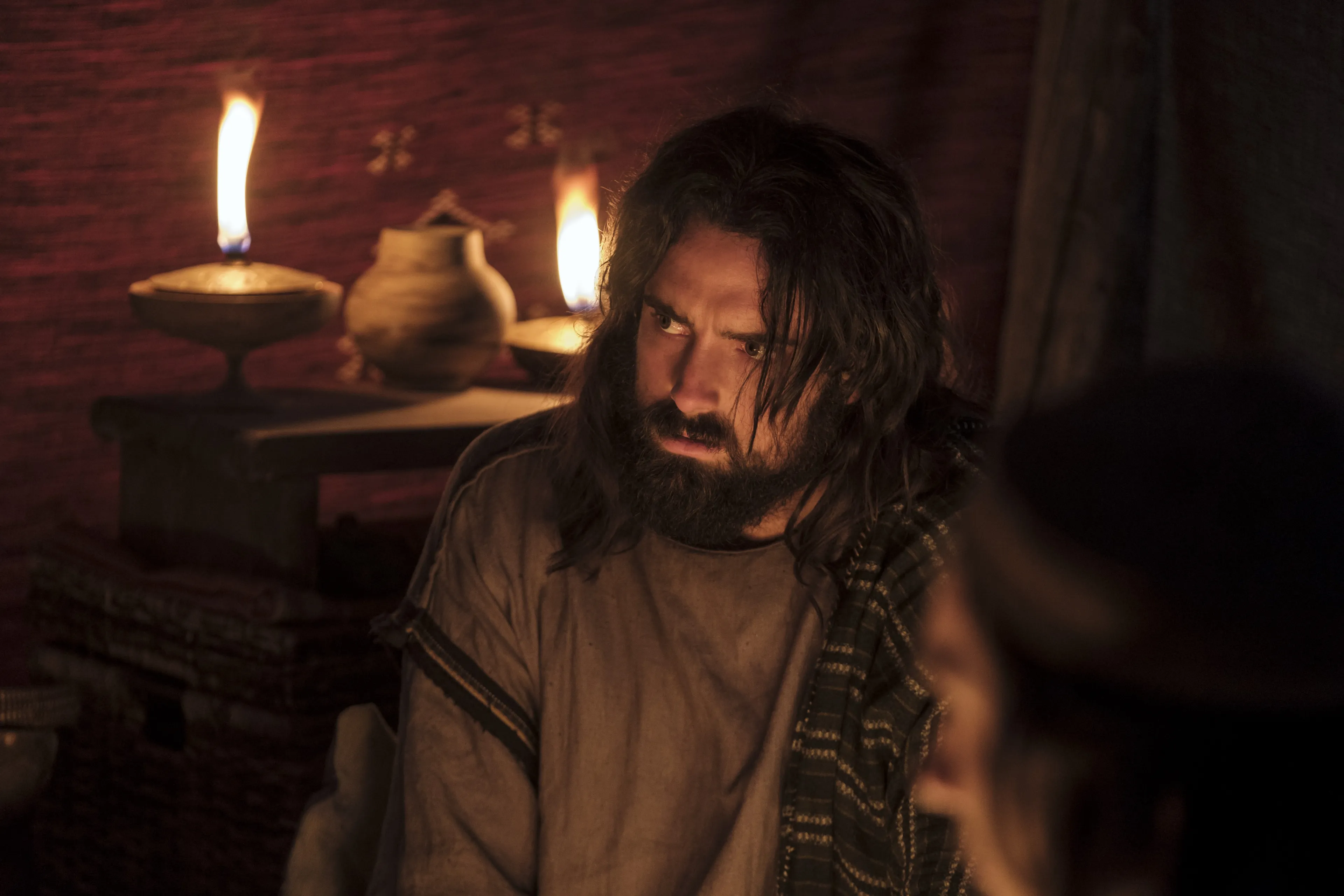 Lemuel listens as Lehi talks about his vision of the tree of life.