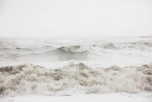 Waves crashing on a beach in Iceland.
