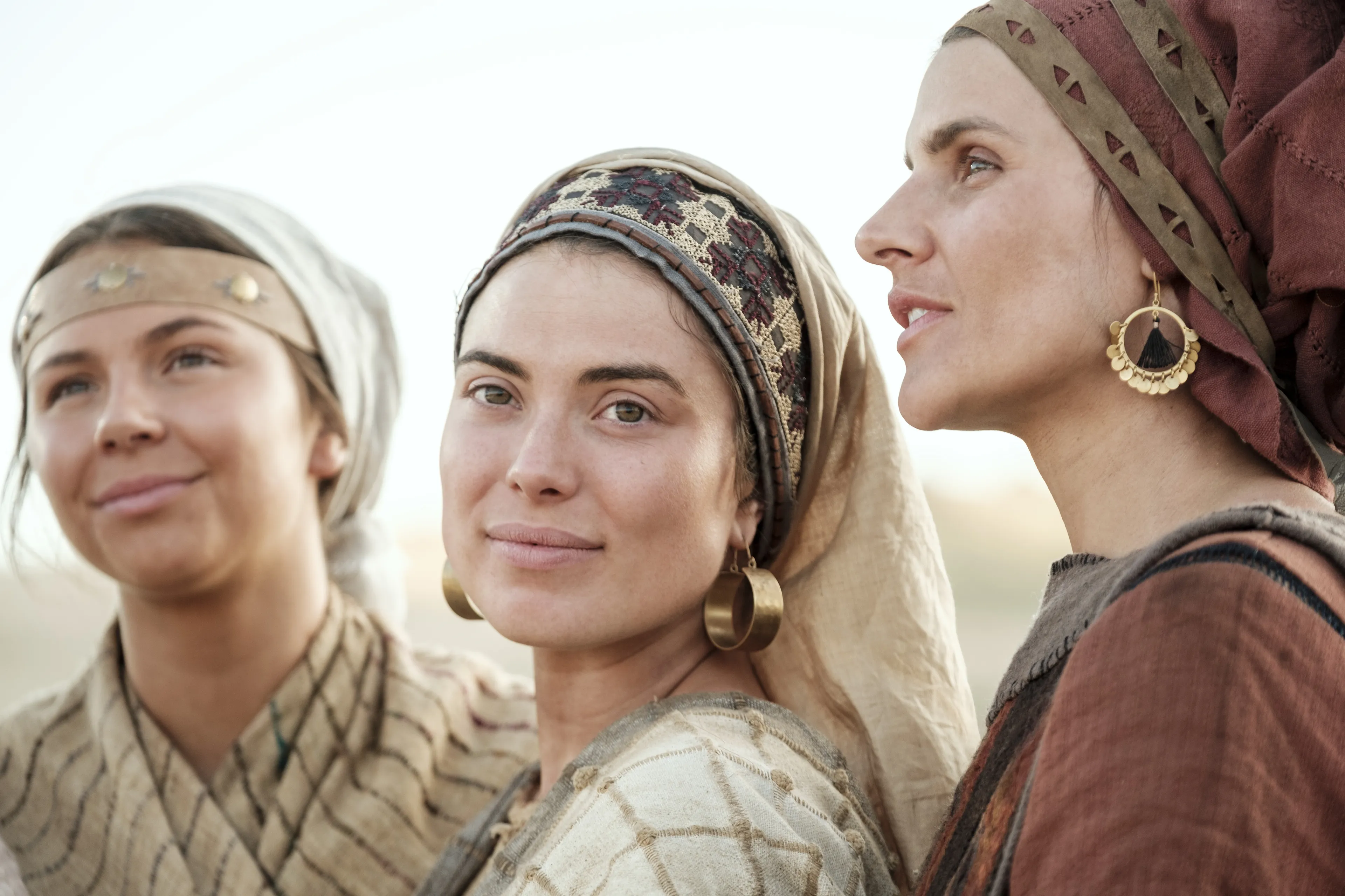 Ishmael's daughters smile.