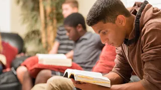 A group of youth reading scriptures together in Florida.