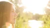 young woman in bright sunlight