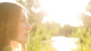 Profile of a Young Woman in bright sunlight.