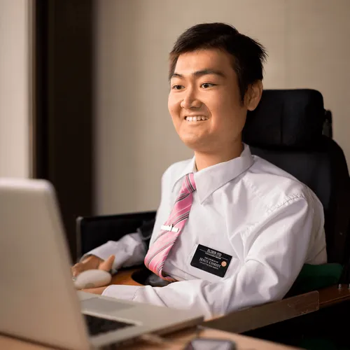 service missionary at a computer