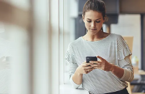 woman using cell phone