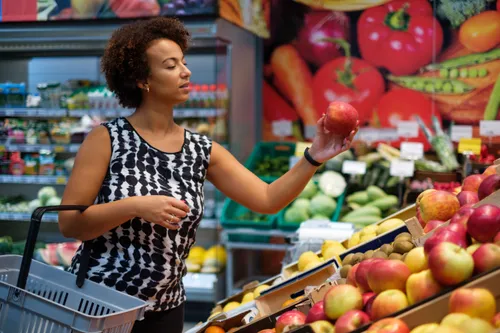 Woman shopping at grocery store