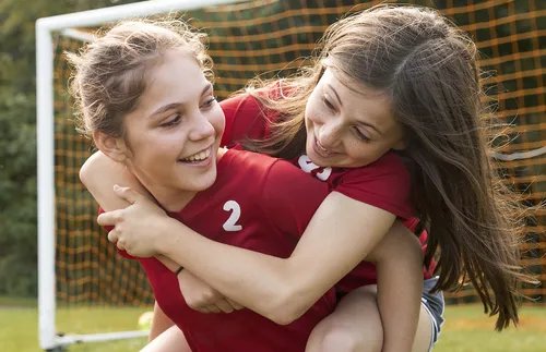 girls in soccer outfits