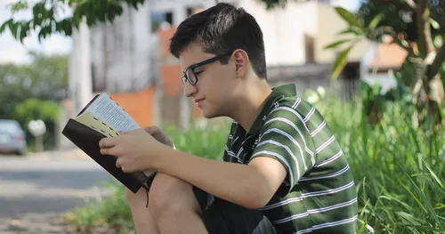 young man reading scriptures