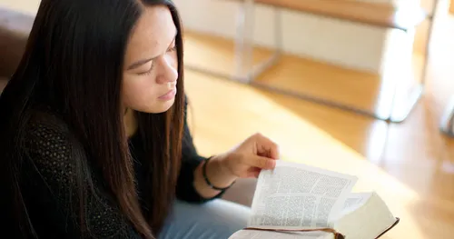 young woman reading scriptures