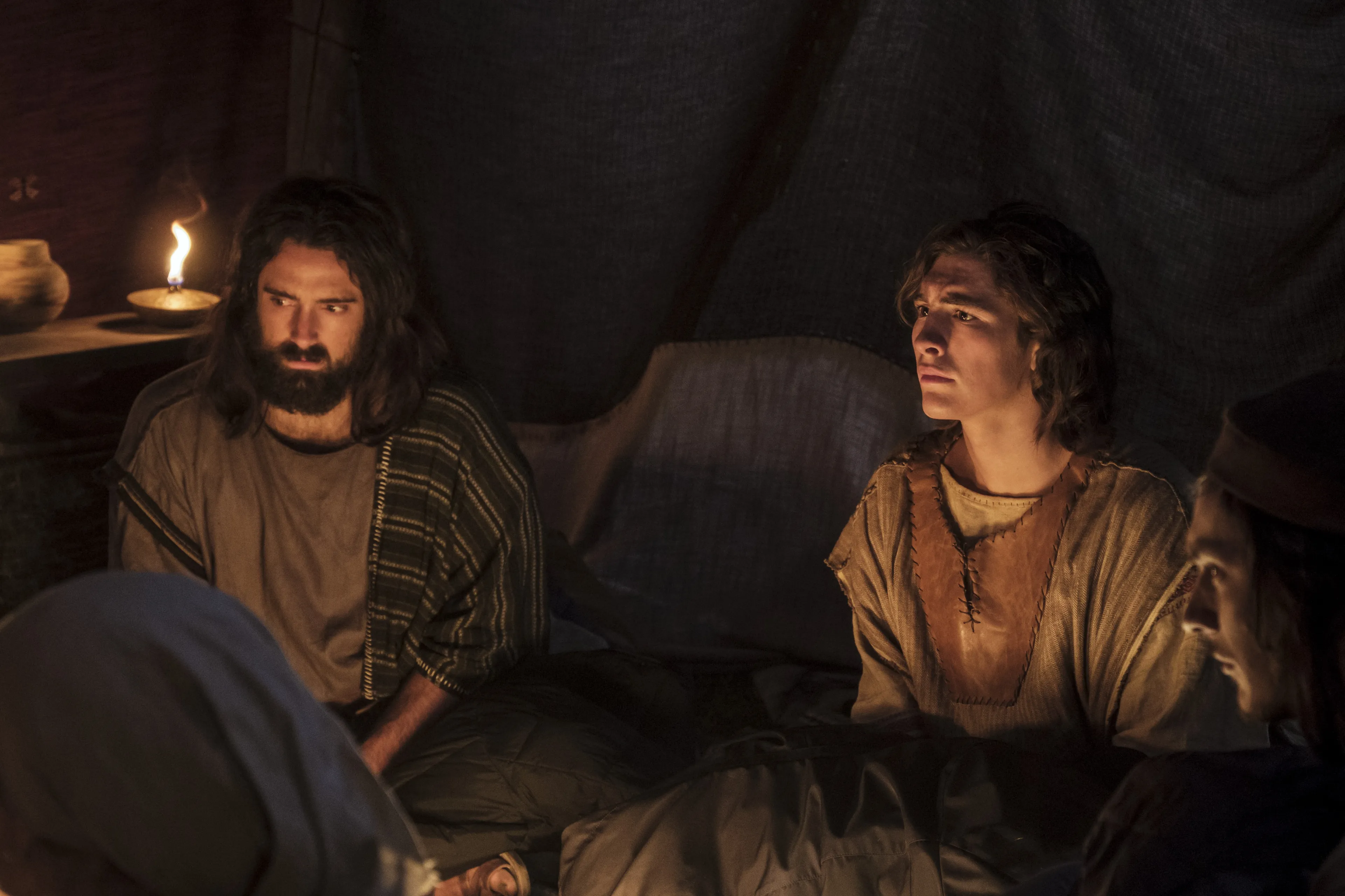 Nephi and Lemuel listen as Lehi tells his family about his vision of the tree of life.