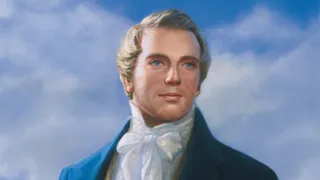 Portrait of Joseph Smith Jr. standing and holding a copy of the Book of Mormon.