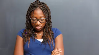 a young woman praying