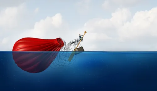 Man rowing in hot air balloon