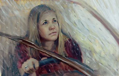 a woman sitting in a car