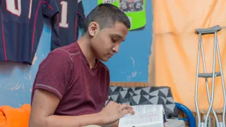 Teen reading scriptures