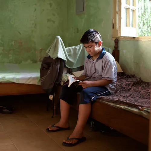 boy reading scriptures