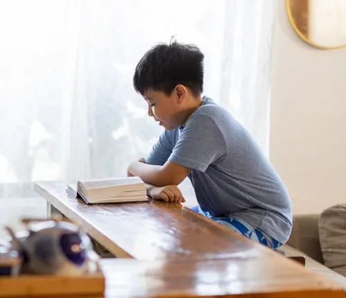 Photo of Adam reading the scriptures