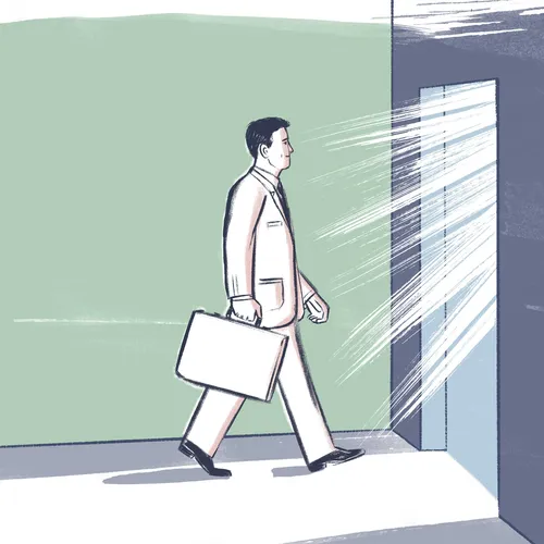 man walking and carrying a briefcase