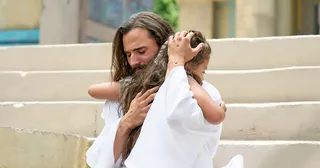 Kristus objímá dítě