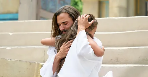 Kristo nga naggakos og usa ka bata