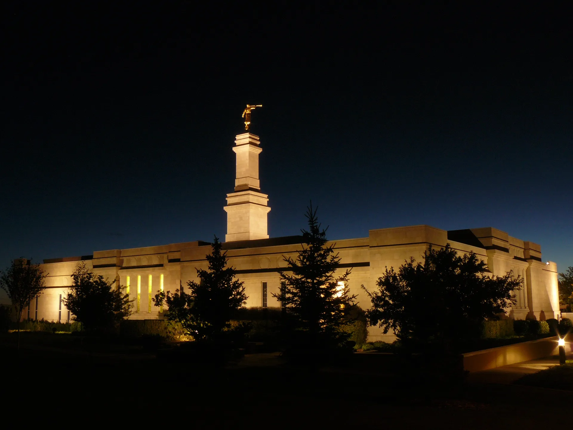 The Monticello Utah Temple in the evening, including scenery.