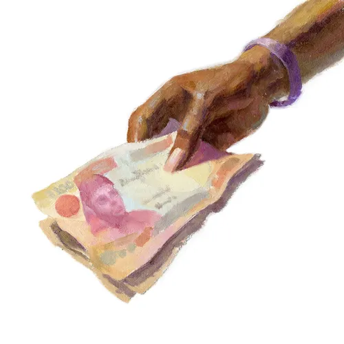 hand holding paper money
