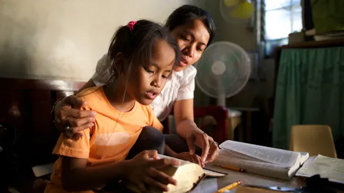 family reading scriptures
