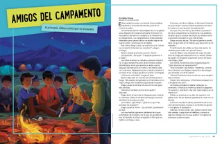 boys sitting around campfire at night