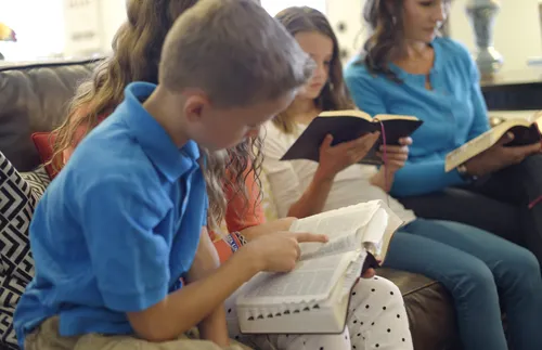 family reading scriptures together
