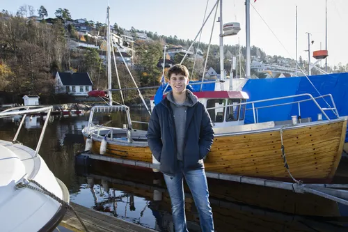 young man at a marina